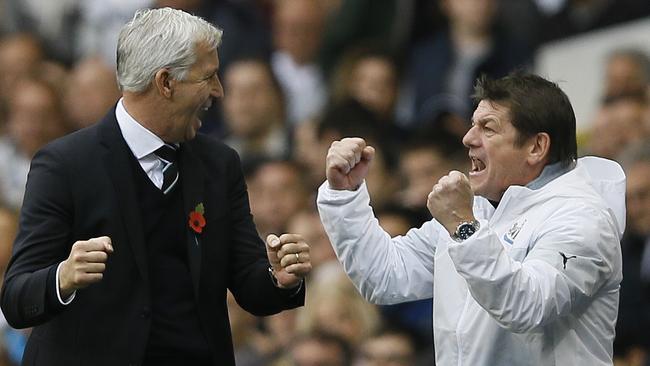 Newcastle's manager Alan Pardew, left, celebrates with Assistant manager John Carver.