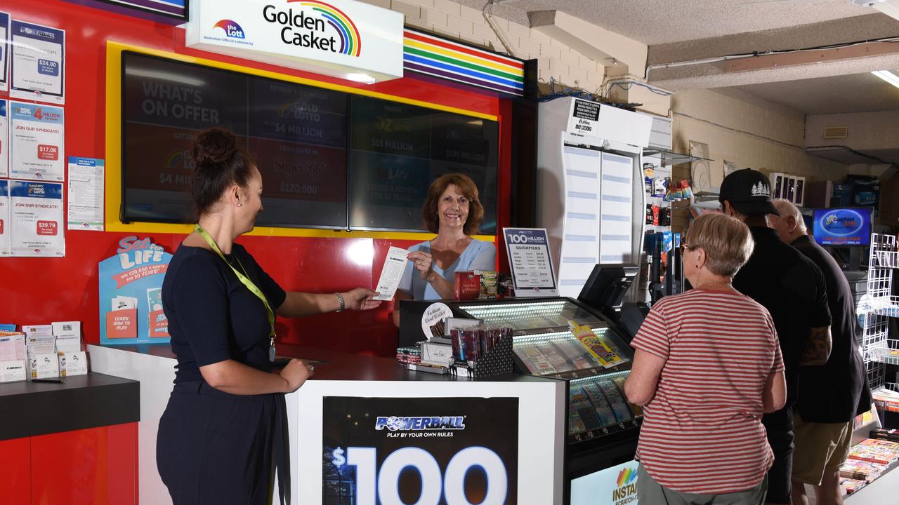 Customers hoping to get lucky in the 100 million Powerball at a newsagency in Scarborough, WA. Picture: Steve Holland