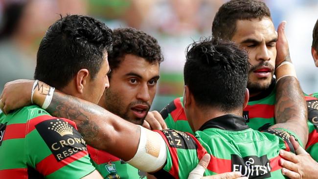 Alex Johnston celebrates scoring a try with Greg Inglis.