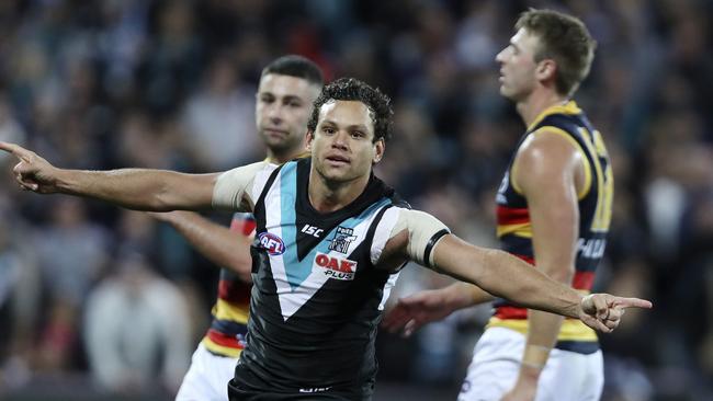 Steven Motlop kicks the winning goal against the Crows in Showdown 45. Picture Sarah Reed