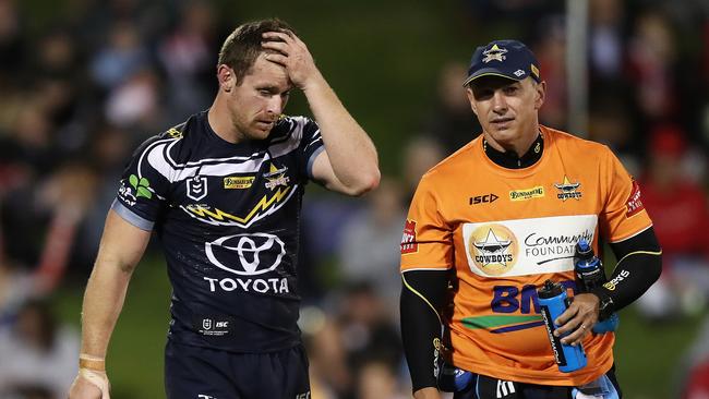 Michael Morgan leaves the field after a copping a head knock. Picture: Brett Costello