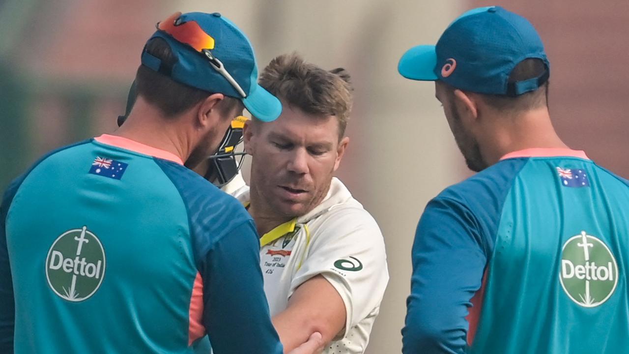 David Warner will miss the rest of the second Test with concussion. (Photo by Money SHARMA / AFP)