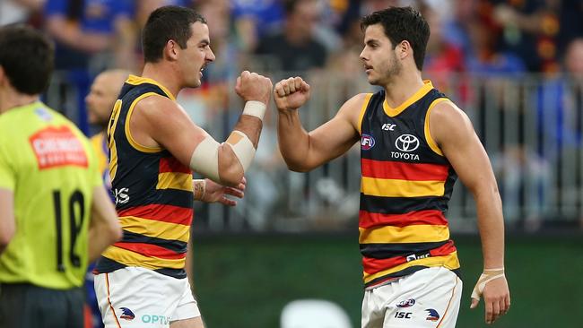 Taylor Walker and Darcy Fogarty celebrate against the Eagles in 2019. Picture: Paul Kane/Getty