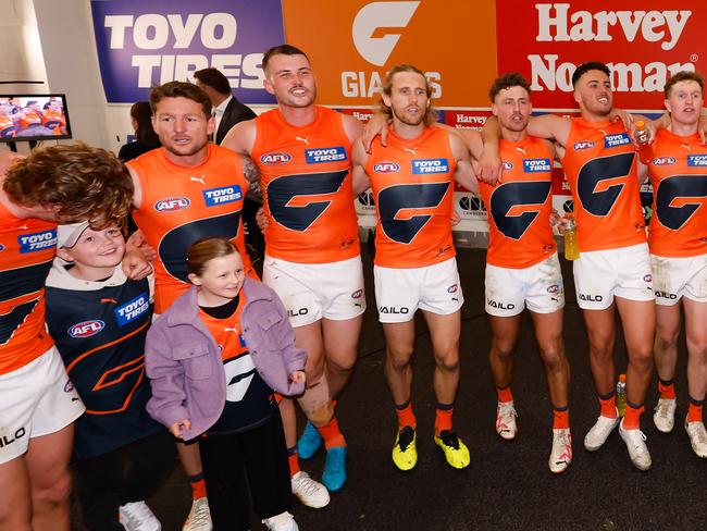 Lloyd’s two kids were in the middle of the action after their win over St Kilda. Picture: Dylan Burns/AFL Photos via Getty Images
