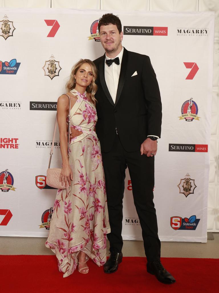 Hannah Redden wearing Zimmermann, and Jarrad Redden pose for a picture on the red carpet at Adelaide Oval in North Adelaide, for the Magarey Medal, Monday, September 9, 2019. Picture: Matt Loxton