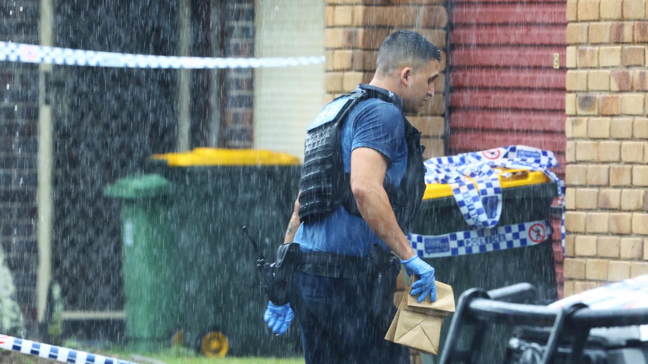 Detectives on scene the day Ms Marshall was found. Picture: Lachie Millard