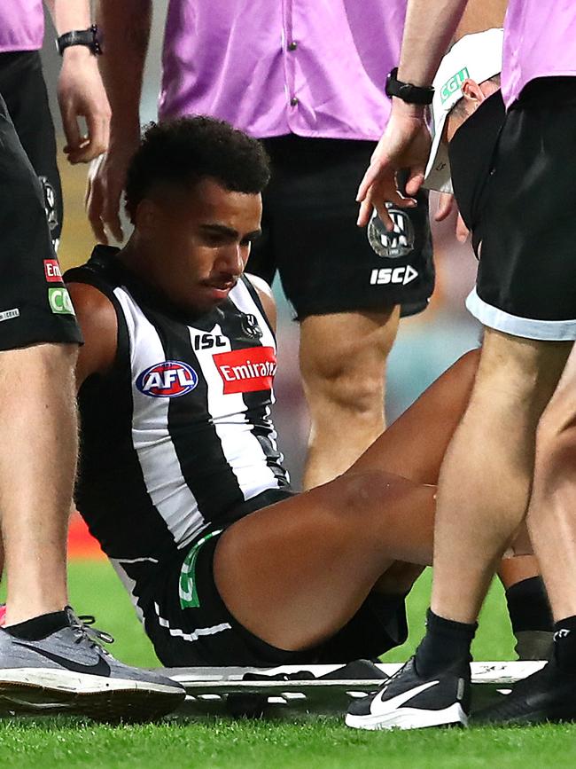 Isaac Quaynor remains calm after injuring his leg against Sydney. Picture: Jono Searle/AFL Photos/via Getty Images