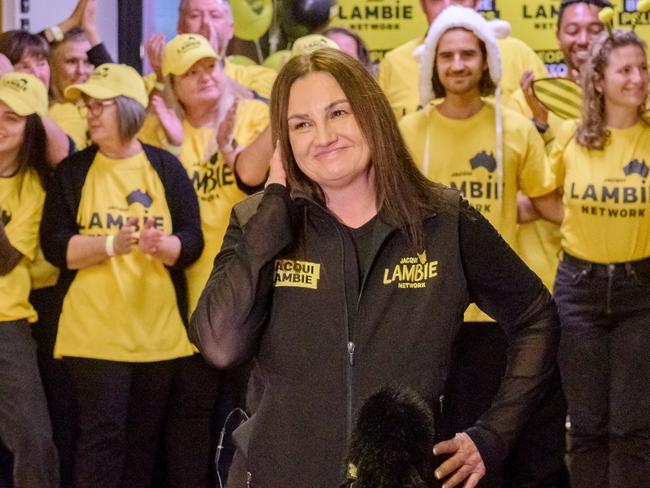 Senator Jacqui Lambie speaks to the media with supporters at her party gathering on Election Night. Picture: Simon Sturzaker