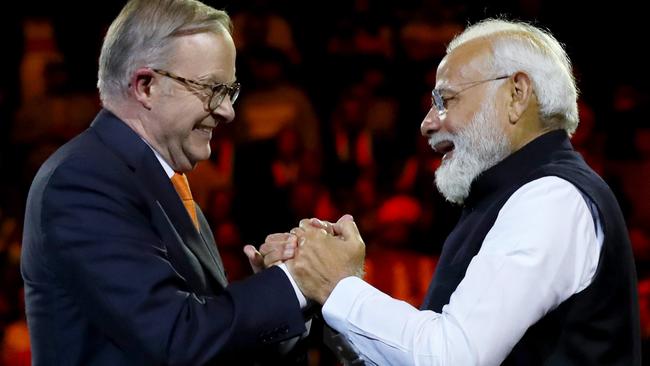 SYDNEY, AUSTRALIA - MAY 23: India's Prime Minister Narendra Modi (R) and Australia's Prime Minister Anthony Albanese shake hands while attending an Indian cultural event on May 23, 2023 at the Qudos Bank Arena in Sydney, Australia. Modi is visiting Australia on the heels of his and Australia's Prime Minister Anthony Albanese's participation in the G7 Summit in Japan. (Photo by Lisa Maree Williams/Getty Images) *** BESTPIX ***