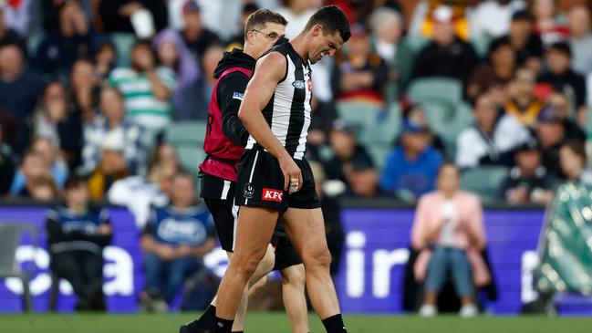 Scott Pendlebury hurt his ribs against Hawthorn. Picture: Michael Willson/AFL Photos via Getty Images