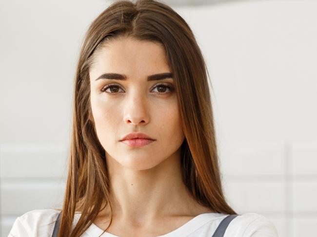 Coffee Business owner Concept - attractive young beautiful caucasian barista in apron with confident looking at camera in coffee shop counter.