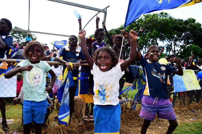 Ranku Eagles supporters go wild after a goal against the Tapalinga Superstars during this year's 49th Annual Tiwi Grand Final on Bathurst Island, 80km's north of Darwin, NT. Picture: Justin Kennedy