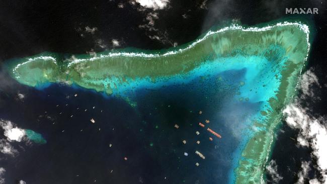 Chinese vessels anchored at the Whitsun Reef, around 320 kilometres west of Bataraza in Palawan in the South China Sea. Picture: Maxar