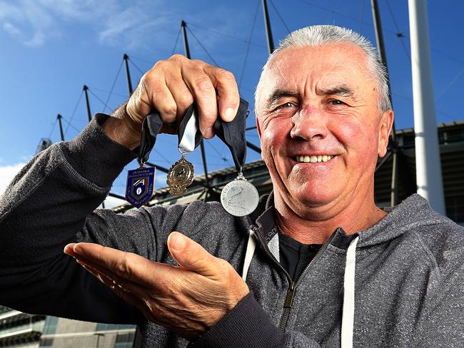 Collingwood Champ, Tony Shaw with his 1990 best-and-fairest, Copeland and Norm Smith Medal. Picture: Tim Carrafa