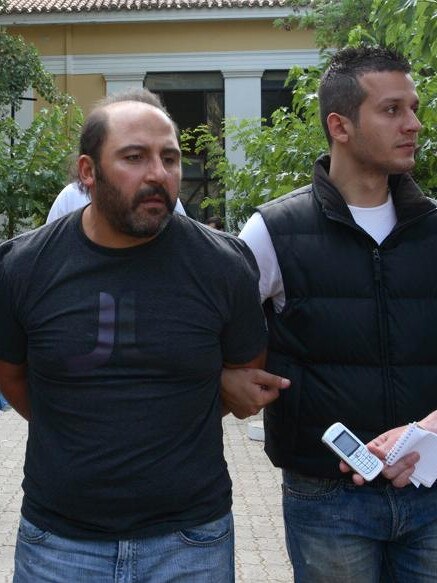 Tony Mokbel in custody in Greece.