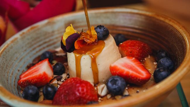 Organic Buckwheat Hotcake with fresh Berries, Wattleseed Pannacotta, native seeds, nuts and Cinnamon syrup from Laneway Specialty Coffee. Picture Glenn Campbell