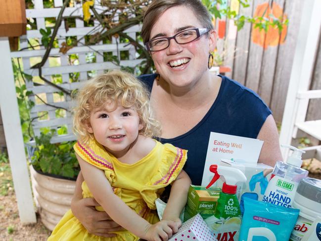 Jeddah Barwick from Dunalley Neighbourhood House and her daughter Arden aged 2 with some of the items that are to be distributed in care packs.Picture: Linda Higginson