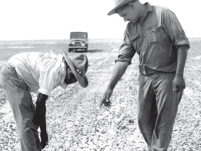 A tracker helping police on the Page family tragedy on the Birdsville Track in 1964. 