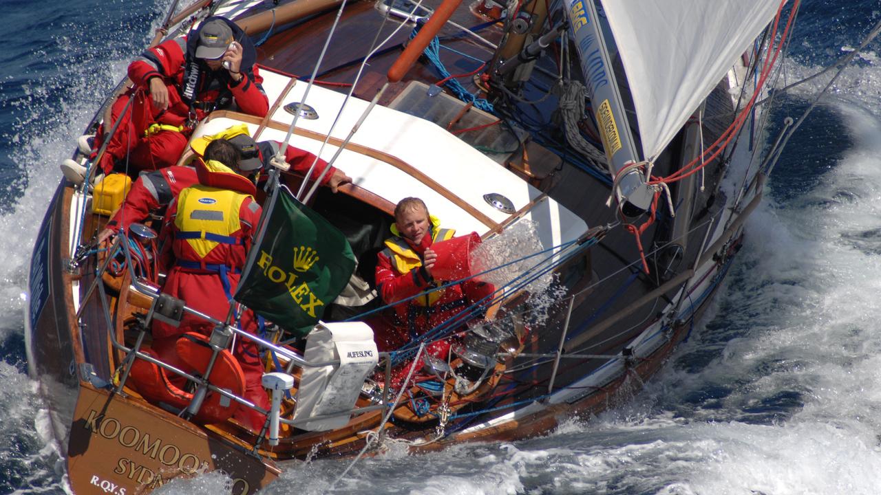 Crew members bailing water from sinking vintage yacht Koomooloo during Sydney to Hobart race off coast of New South Wales 27 Dec 2006. a/ct marine accident