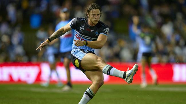 Nicho Hynes sends a conversion over. Picture: Brett Hemmings/Getty Images.