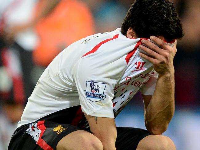 LONDON, ENGLAND - MAY 05: A dejected Luis Suarez of Liverpool reacts following his team's 3-3 draw during the Barclays Premier League match between Crystal Palace and Liverpool at Selhurst Park on May 5, 2014 in London, England. (Photo by Jamie McDonald/Getty Images)