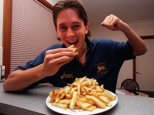 Skinny Scott Bamford, posing with potato chips while playing for Fitzroy in 1996.