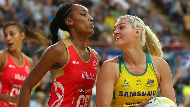 Australia’s Gretel Tippett takes control of the ball under pressure from England’s Layla Guscoth on Tuesday night. Picture: Getty Images