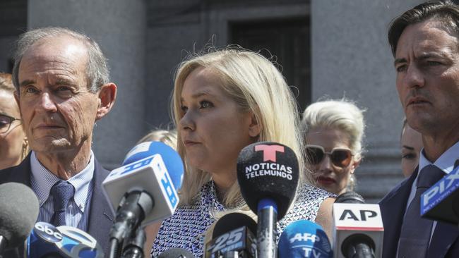 Virginia Giuffre, center, holds a news conference outside a Manhattan court in New York in 2019. Picture: AP