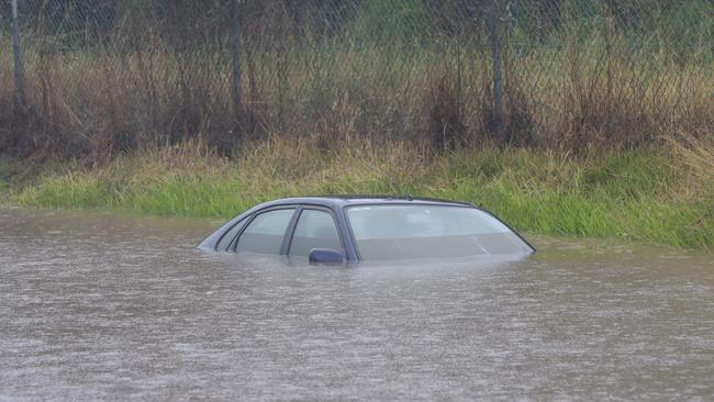 A car underwater on the Gold Coast. Picture: Glenn Hampson