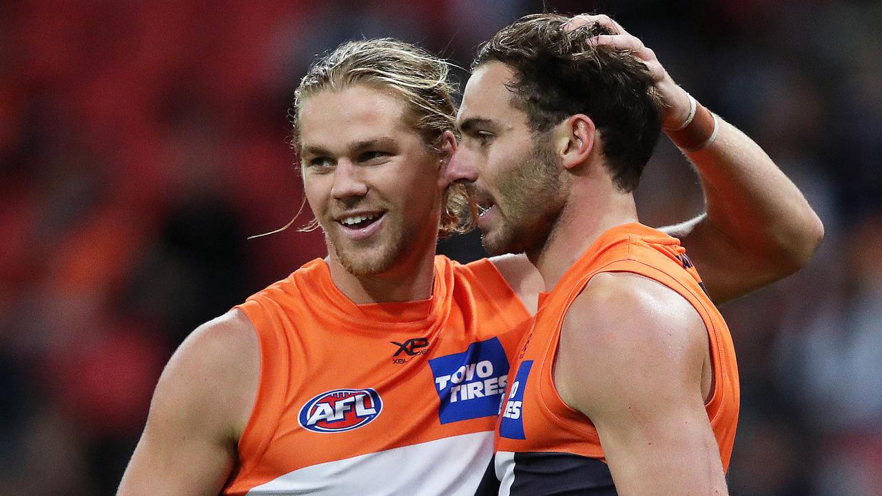 Giants Harry Himmelberg celebrates the goal of Jeremy Finlayson — along with Jeremy Cameron, the trio are becoming serious weapons in the Giants’ forward line