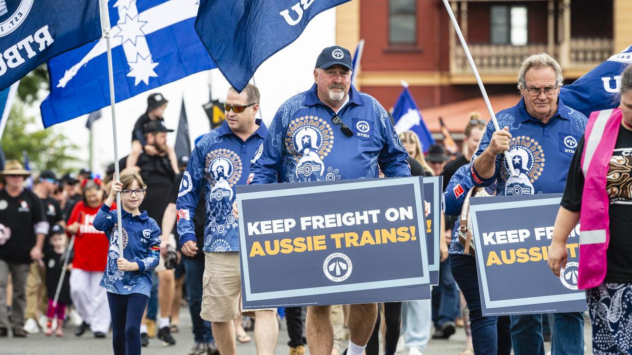 Graham Talbot (front, centre) and Greg Jordan (left) show their support for the RTBU at the Labour Day 2022 Toowoomba march, Saturday, April 30, 2022. Picture: Kevin Farmer