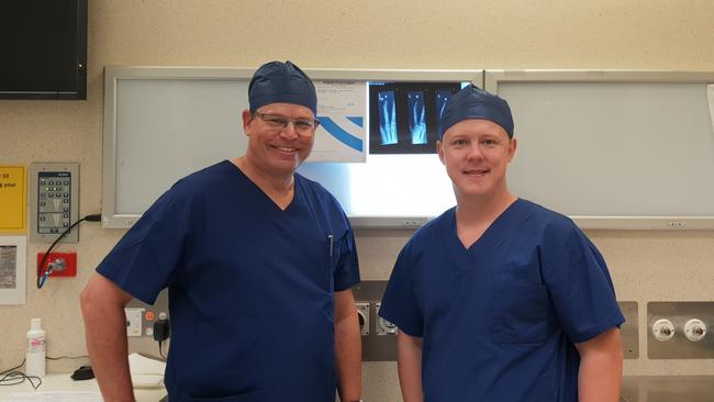 Othopedic surgeon Dr Greg Couzens (left) with Dr Chris Jeffery at the Brisbane Private Hospital.