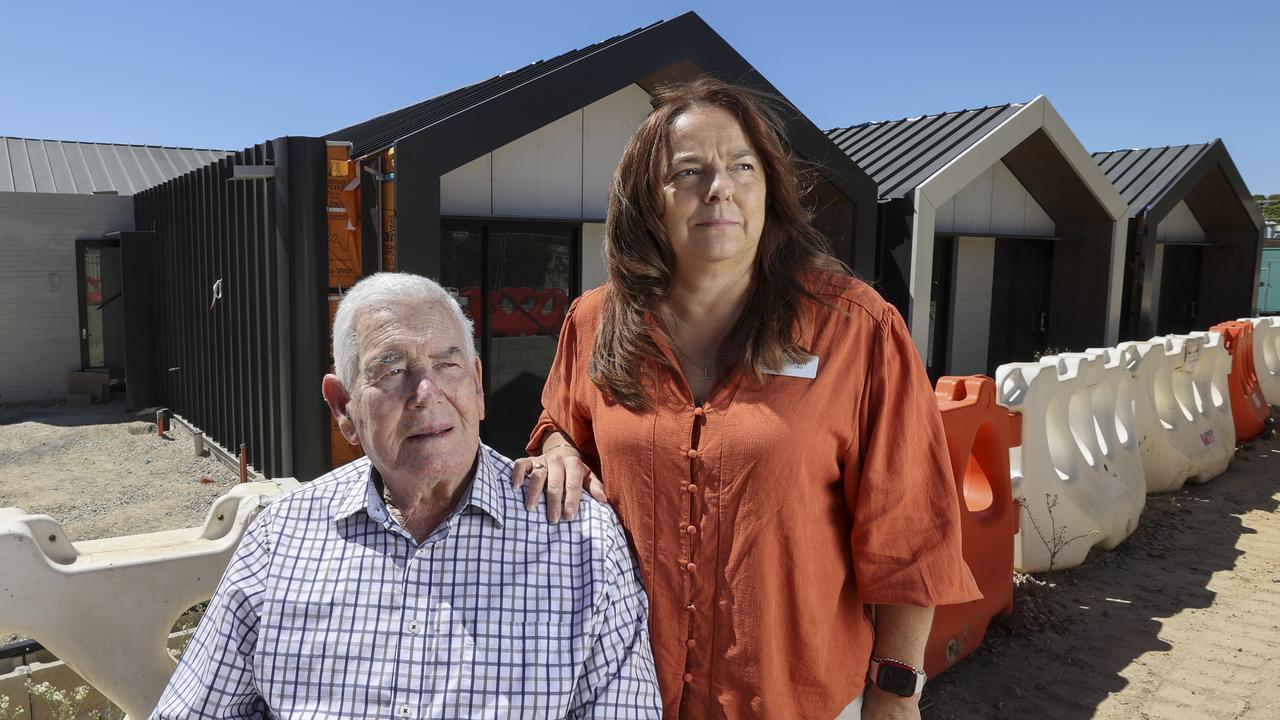 Resident Des Shanahan and Wheatfields CEO Pam Charnock at the almost completed second building. Picture: Brett Hartwig