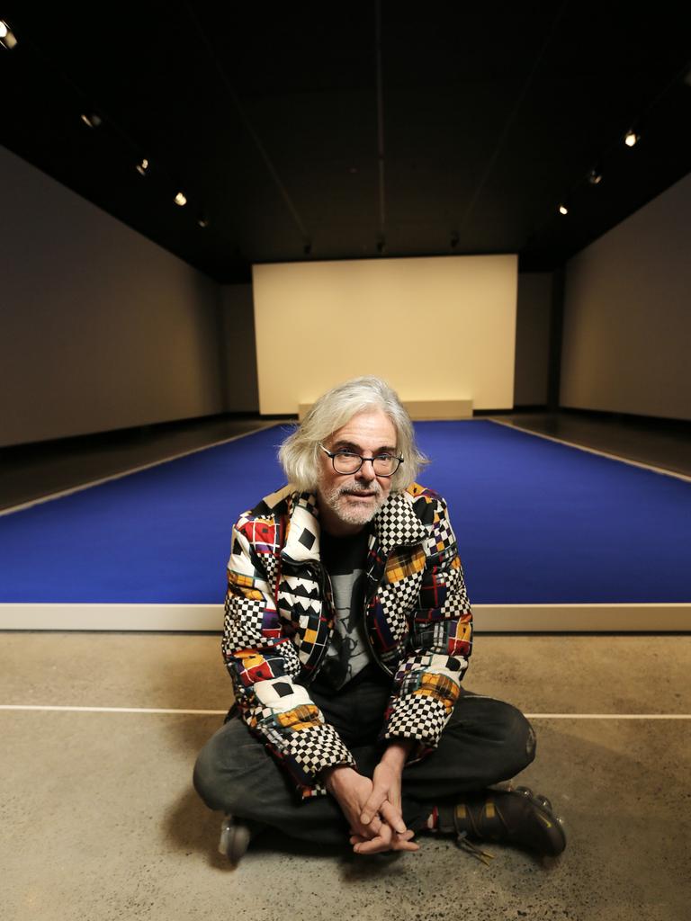 <p>MONA creator David Walsh in front of one of Yves Klein's blue period works, part of the ZERO exhibition, which featured in Tasmania’s Dark Mofo arts festival in 2018. Picture: MATHEW FARRELL</p>