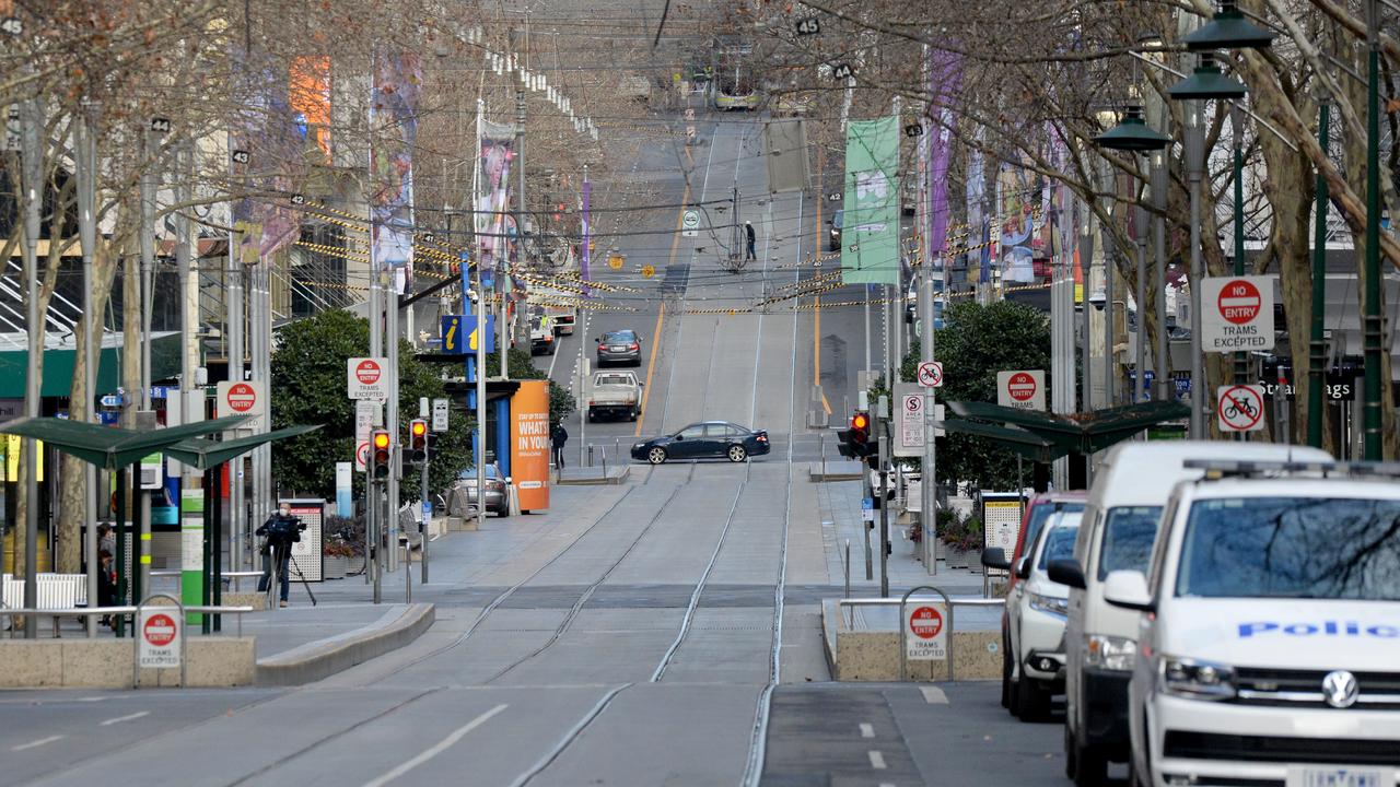 Bourke Street is almost deserted after stage 4 restrictions were introduced on Sunday night. Picture: Andrew Henshaw/NCA NewsWire