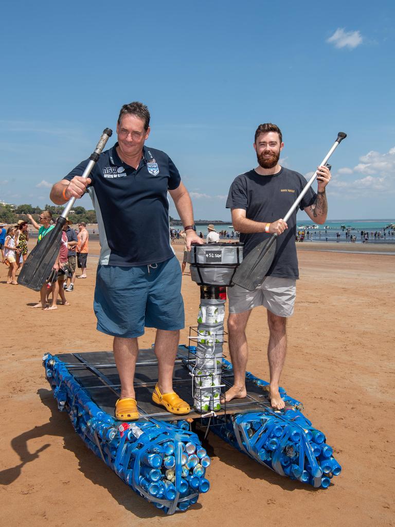Mathew Schiller and Mad Lancashire with their boat close enough at the Darwin Beer Can Regatta at Mindil Beach, 2024. Picture: Pema Tamang Pakhrin
