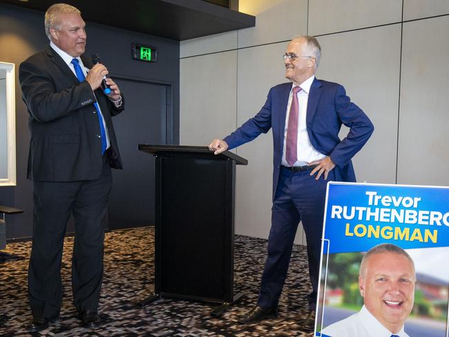 Australian Prime Minister Malcolm Turnbull looks on as LNP Candidate for Longman, Trevor Ruthenberg addresses the Seniors Forum at the Sandstone Point Hotel. Picture: AAP Image/Glenn Hunt