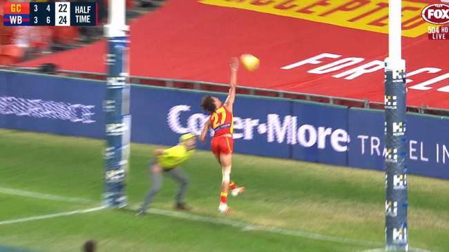 Gold Coast's Wil Powell owned up to not touching this Western Bulldogs goal on the line.