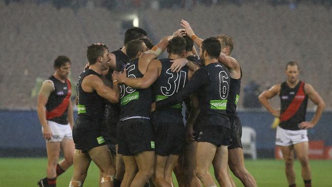 Blues players celebrate their win over the Bombers on the siren in Round 3, 2017. Picture: Wayne Ludbey