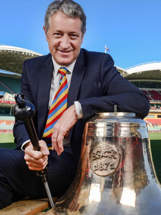 Former SACA president Andrew Sinclair with the Bradshaw Bell prior to its unveiling in 2021. Picture: Brenton Edwards