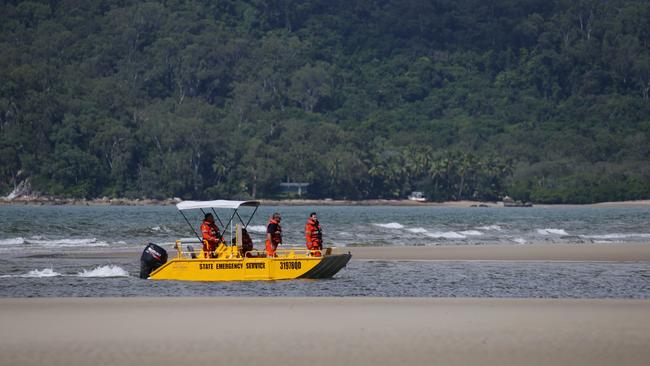 SES officers search the beach and waterways of Thornton Beach for Cindy Waldron the following day. Picture: Marc McCormack