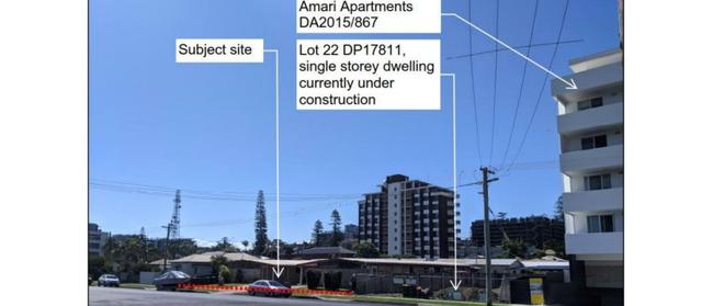 The proposed site (front boundary in red) and adjoining land use pattern, looking northwest across.