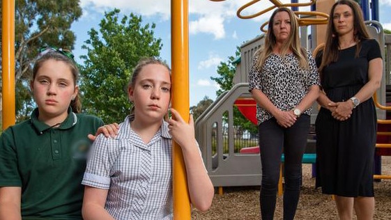 Emme, 11, (left) and Milly 10 with mums Nikki and Jennifer (right) have been left shaken after the brazen alleged girl gang attack. Picture: Jason Edwards