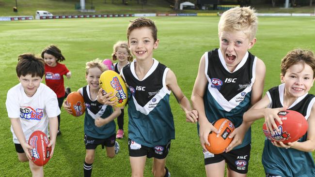 Kids including Mya and Adam Nussbaum, Phoebe Brandon, Eli Langham, Jack Brandon, Mac Seebeck, Leo Langham are ready for AusKick. Parents are swamping a government scheme which puts $100 towards their kids’ sport of choice. Picture: Darren Leigh Roberts