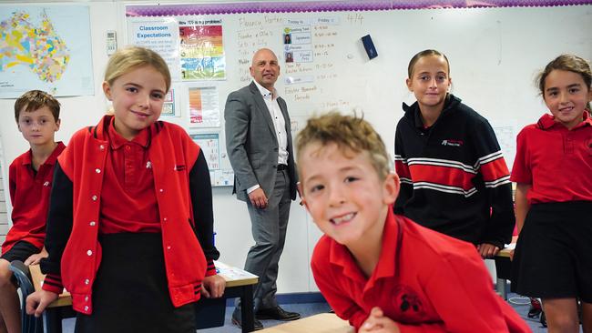 Chelsea Heights Primary School principal Steven Capp with students Lewis, left, Billie, Lachlan, Molly and Maddie. The school has embraced back-to-basics maths lessons. Picture: Luis Enrique Ascui