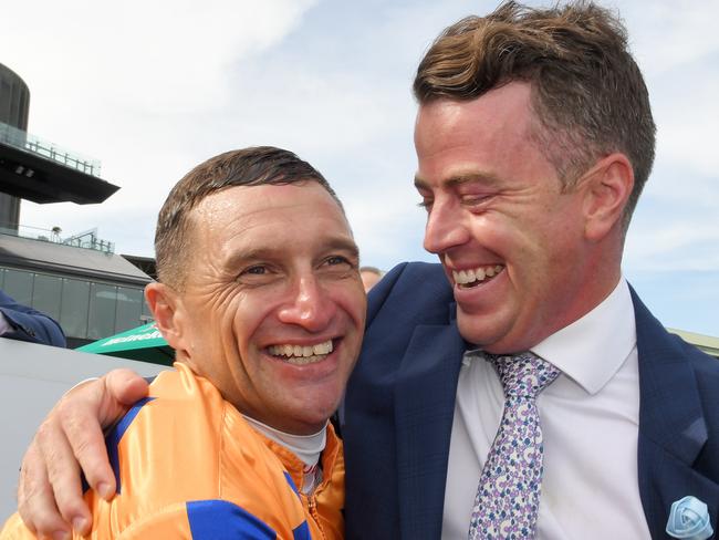 Opie Bosson with trainer Jamie Richards after riding Te Akau Shark to victory in the Chipping Nortion Stakes.