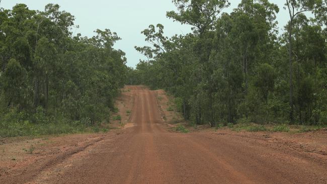 Anindilyakwa Land Council cars travel down the dirt road to the site of the Anindilyakwa Healing Centre, as part of a series of justice reforms for the Groote Archipelago. Picture: Zizi Averill