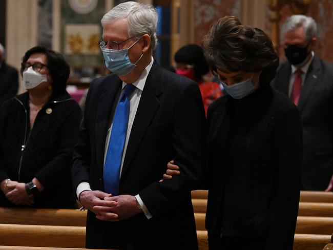 US Senator Mitch McConnell and his wife, former US Transportation Secretary Elaine Chao, attend the mass. Picture: AFP