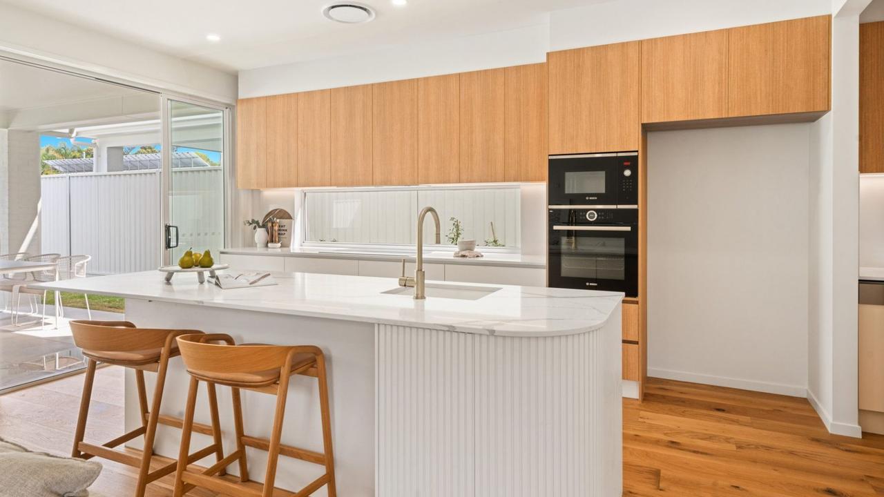 It features an open-plan kitchen space with ‘contemporary coastal interiors’ according to the listing.