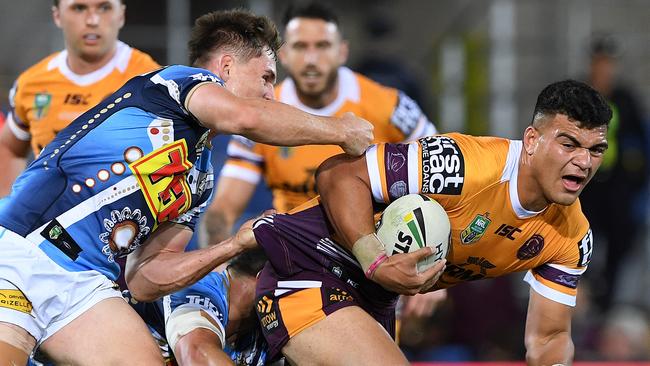 David Fafita of the Broncos is tackled during the Round 17 NRL match between the Gold Coast Titans and the Brisbane Broncos at Cbus Super Stadium in Robina on the Gold Coast. Sunday, July 8, 2018. (AAP Image/Dave Hunt) NO ARCHIVING, EDITORIAL USE ONLY